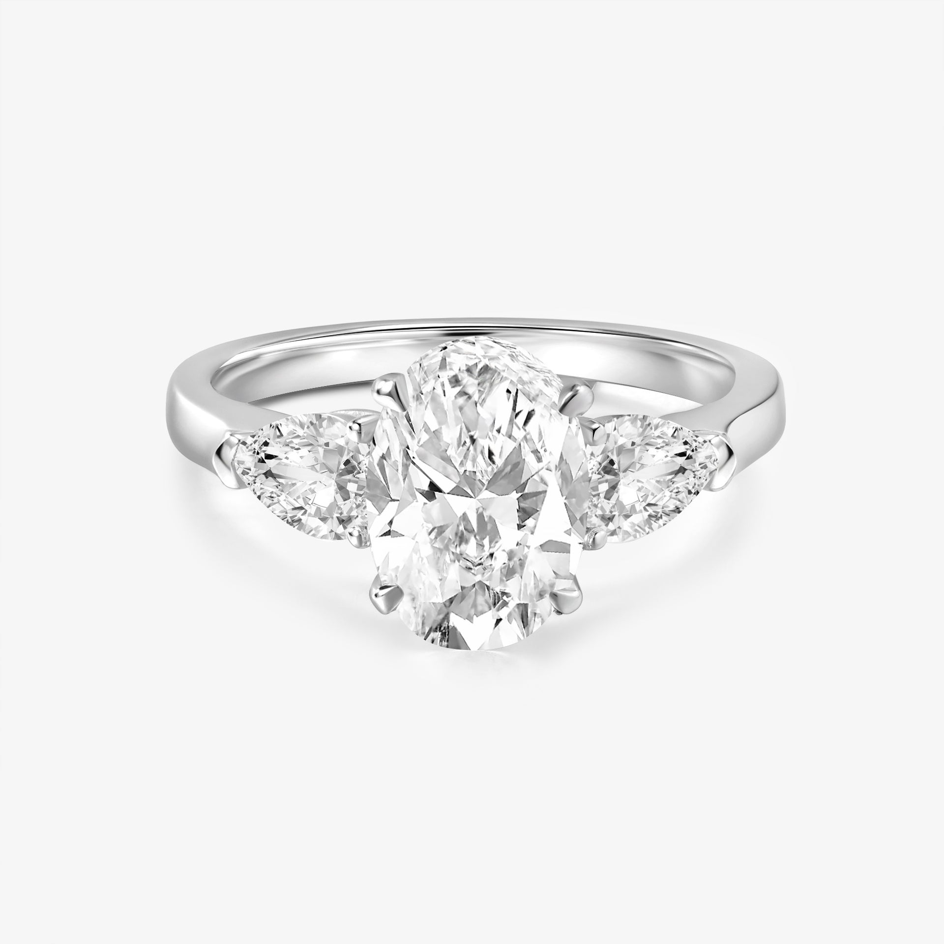 Harmony Three Stones Oval Cut Diamond Ring